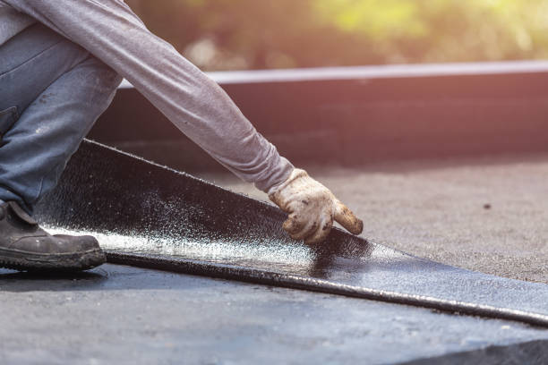 Professional Waterproofing technician working in Alexander, NY